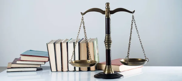 The Scales of Justice & Books